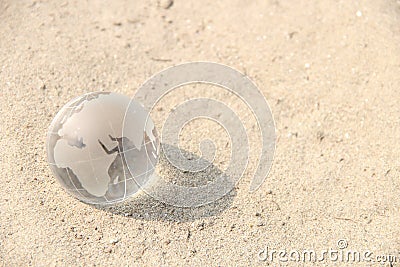 Transparent Globe on sand â€“ Europe Stock Photo